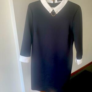 Black Dress with White Collar and Tie Bar